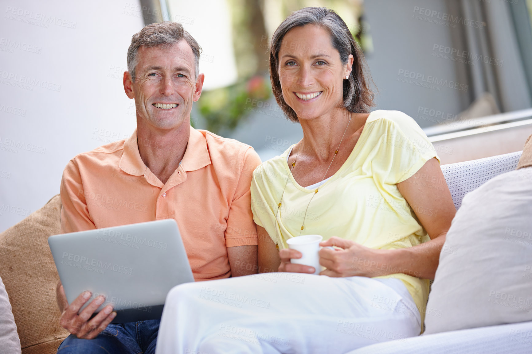 Buy stock photo Mature couple, portrait and relax with tablet on sofa for entertainment, connection or network at home. Happy, man and woman with smile, technology or coffee for morning, weekend or holiday at house