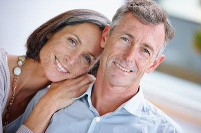 Buy stock photo Portrait of a loving mature couple at home