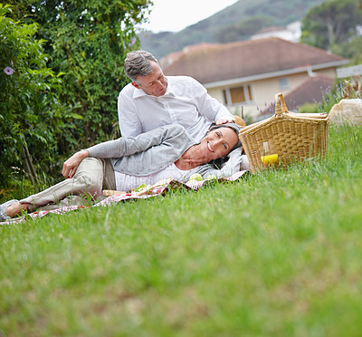 Buy stock photo Care, mature couple and portrait with picnic for nutrition, food or bonding together with connection. Happy people, man or woman with basket for anniversary, relax or affection with trust in backyard