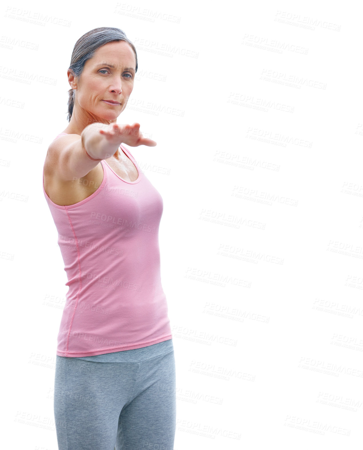 Buy stock photo Shot of an attractive mature woman doing yoga outdoors