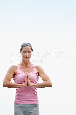 Buy stock photo Fitness, woman and namaste with yoga outdoor for holistic healing, mindfulness and peace of morning routine. Mature, person and space with meditate, chakra and mental health for wellness performance