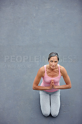 Buy stock photo Yoga, mockup and portrait of old woman with praying hands on floor for meditation, healing and balance from above. Mindfulness, prayer pose and space for elderly lady meditating for zen or wellness