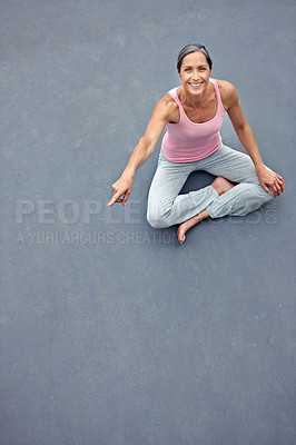 Buy stock photo Fitness, pointing and portrait with mature woman outdoor for advertising or marketing training routine. Exercise, mockup space and smile of athlete person on ground from above for sports workout