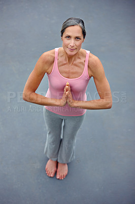 Buy stock photo Mature woman, outdoor and namaste to meditation for peace, calm and mental health for mindfulness. Female person, above and portrait on zen as activity or hobby for wellness, wellbeing and self care