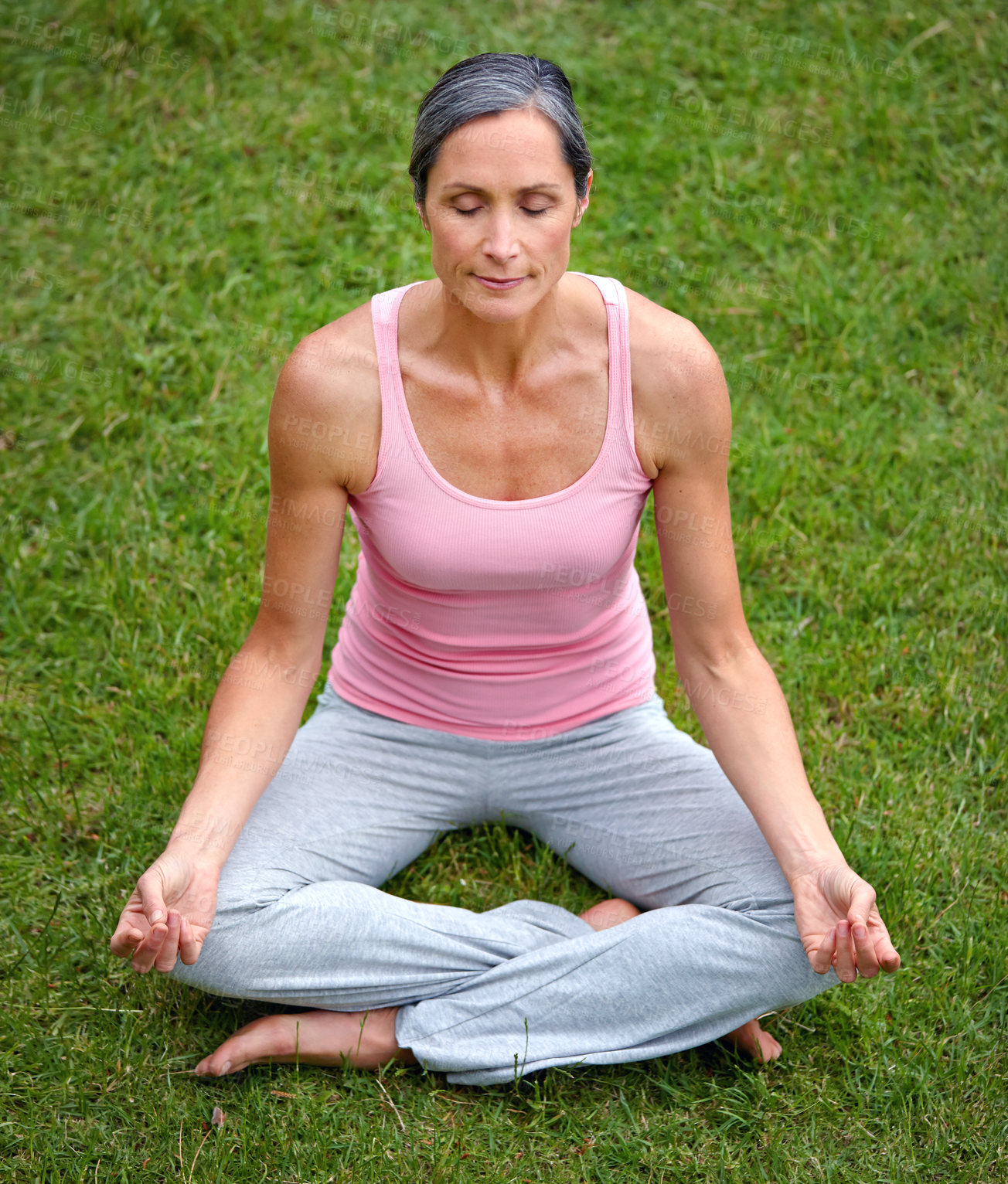 Buy stock photo Woman, outdoor and lotus in yoga for meditation, peace or wellness in garden. Mature fitness person, zen or healthy body on grass for spiritual healing, positive mental health or calm to align chakra