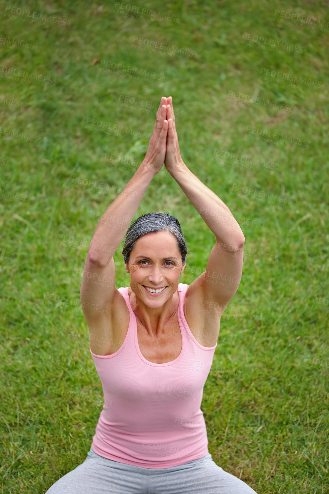 Buy stock photo Portrait of an attractive mature woman doing yoga outdoors