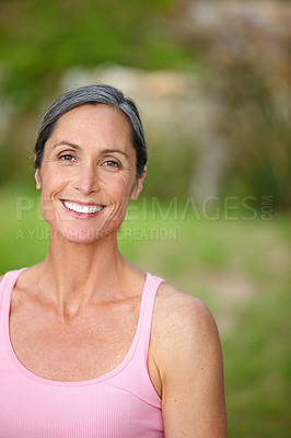 Buy stock photo Portrait of an attractive mature woman in gymwear standing outdoors