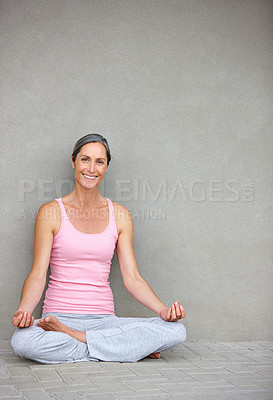 Buy stock photo Yoga, mockup and portrait of old woman in lotus pose on floor for meditation, healing and balance on wall background. Mindfulness, face and happy elderly lady with space in retirement for wellness