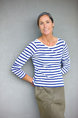 Buy stock photo Mature woman, happy and portrait by wall at office with pride, confidence and small business at media company. Person, writer and editor with smile, job and career at creative agency in Germany