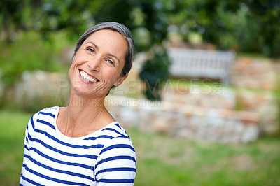 Buy stock photo Mature woman, smile and portrait in garden, nature and excited in backyard with sunshine in morning. Person, happy and outdoor with confidence, pride and break on lawn, summer and blur in Croatia