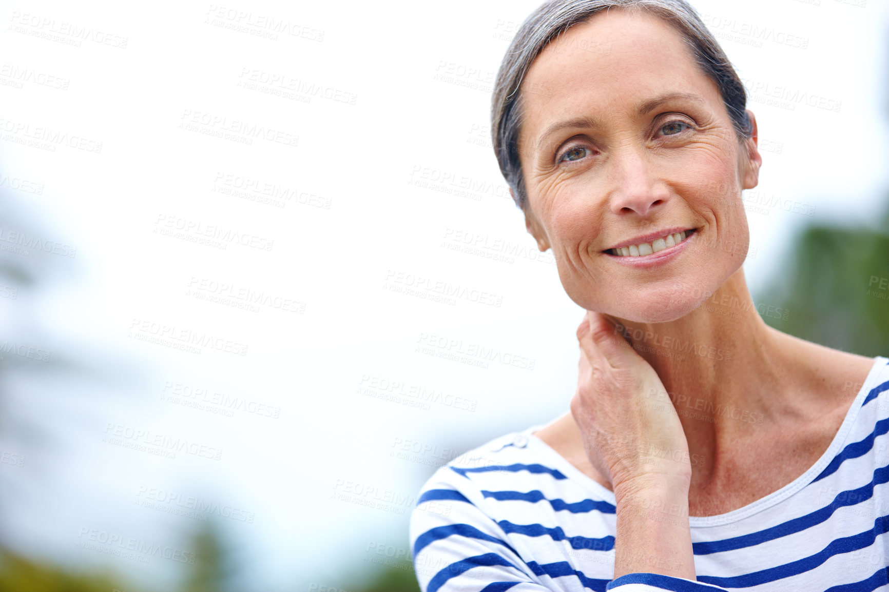 Buy stock photo Mature woman, portrait and outdoor on vacation, peace and countryside for happiness in retirement. Female person, confidence and travel to woods to relax, space and holiday in forest of Switzerland