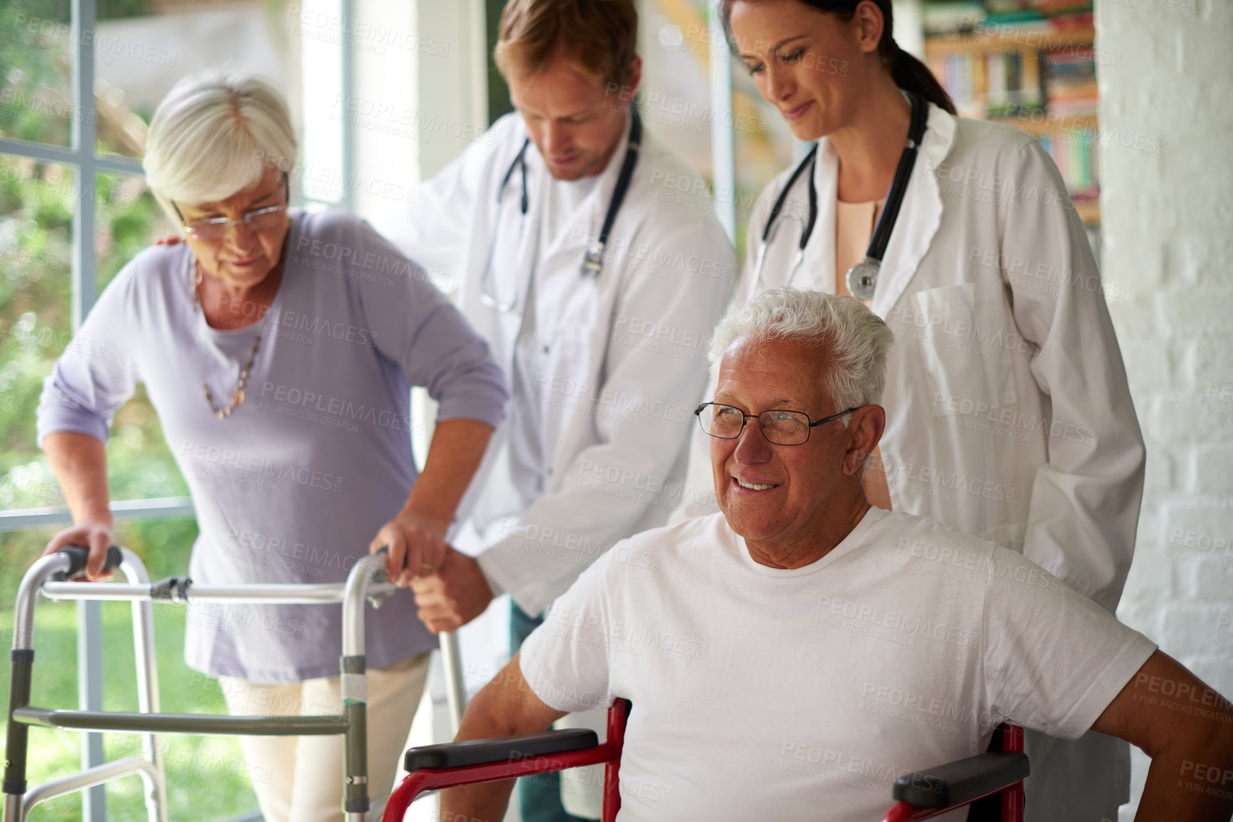 Buy stock photo Doctor, old couple with disability and wheelchair in hopsital for healthcare or medical treatment. Mobility walker, rehab and retirement with senior people in clinic for appointment or checkup