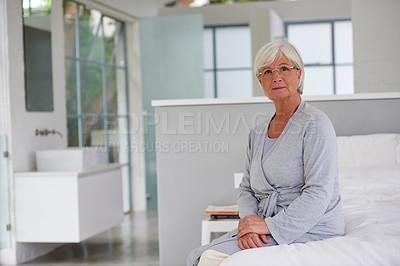 Buy stock photo Shot of a senior woman in her private room in a modern clinic
