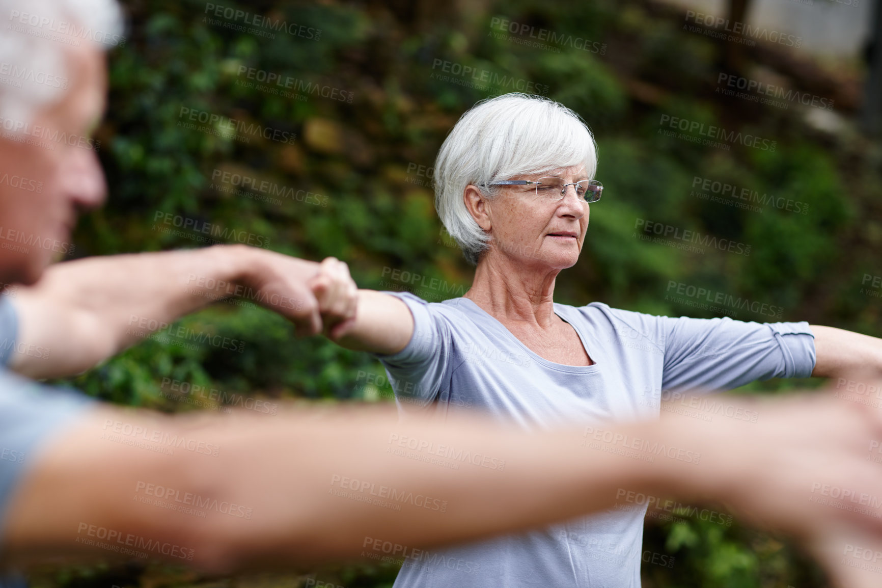 Buy stock photo Meditation, holding hands and peace with old woman in circle in yoga class for spiritual retreat, health and zen. Wellness, fitness and connection with senior people in nature for balance and pilates