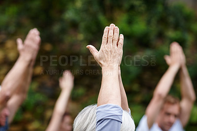 Buy stock photo Cropped shot of a senior person standing with their hands stretched upwards