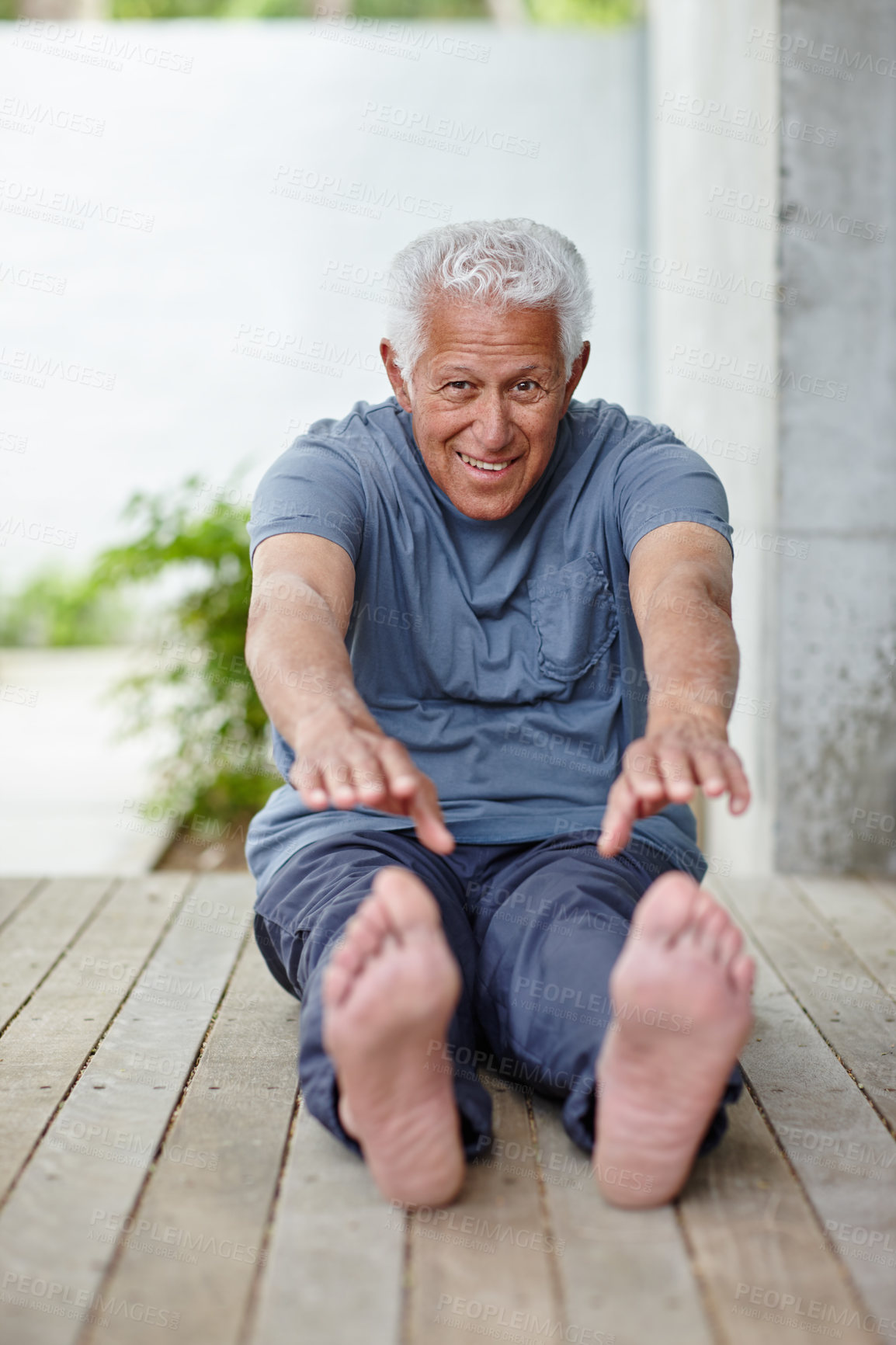 Buy stock photo Old man, stretching exercise and outdoor in portrait, fitness and activity for mobility or joint pain. Male person, floor and backyard of home for healing or peace, wellness and reaching for toes