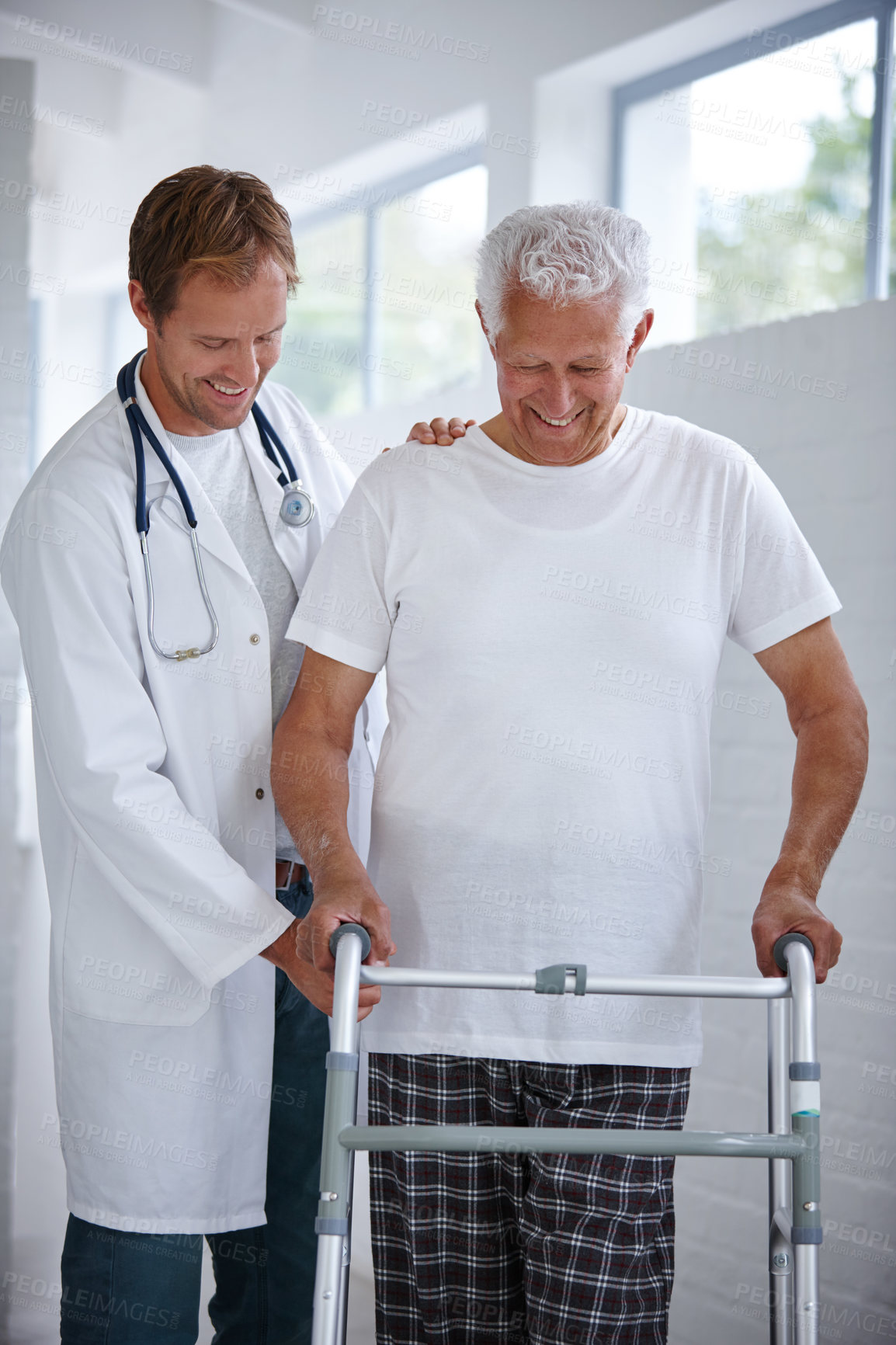 Buy stock photo Happy doctor, walker and help elderly man for support, medical health and community care in home. Patient, walking frame and assist person with disability for retirement, physiotherapy and recovery