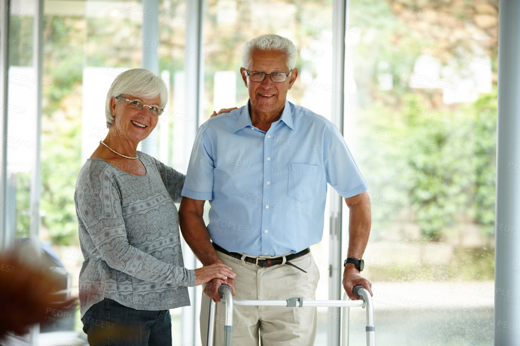 Buy stock photo Walking, frame and portrait of senior couple in nursing home with support, recovery and help for balance. Retirement, health and mature person with disability for mobility, movement and wellness