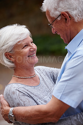 Buy stock photo Shot of a senior couple facing each other