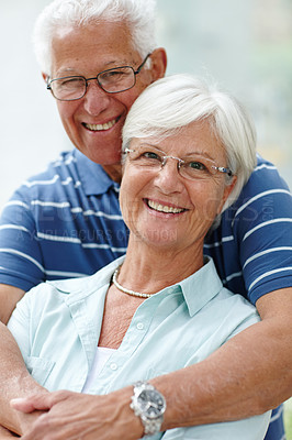 Buy stock photo Portrait of a happy senior couple smiling at the camera