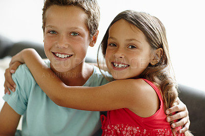 Buy stock photo Children, portrait and siblings hug in home, support and security in childhood relationship. Happy people, brother and sister together for bonding in living room, trust and care for family on sofa