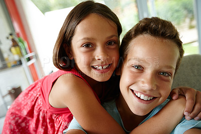 Buy stock photo Portrait of an affectionate brother and sister at home