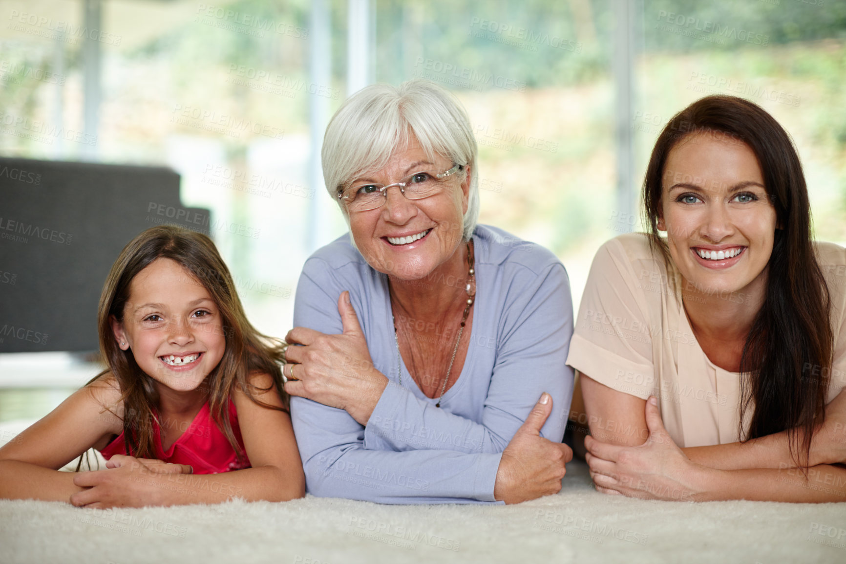 Buy stock photo Women, generations and family portrait in lounge, relax and bonding together on floor of home. People, daughter and mother with grandmother for support in relationship, happy and security in love