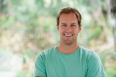 Buy stock photo Shot of a handsome young man at home