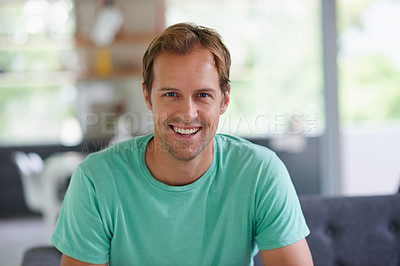 Buy stock photo ortrait of a young man enjoying time at home