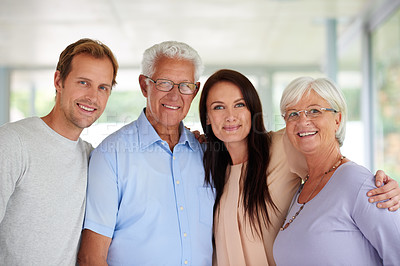 Buy stock photo Shot of a family of four standing together