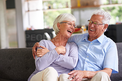 Buy stock photo Shot of a senior couple enjoying each other's company at home