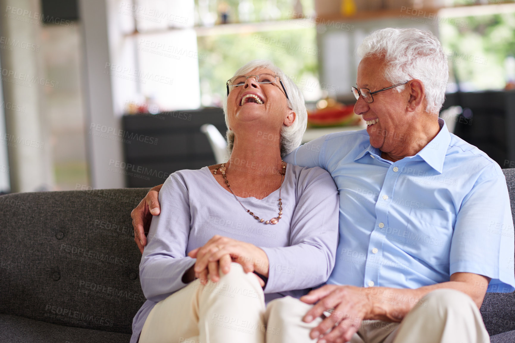 Buy stock photo Shot of a senior couple enjoying each other's company at home