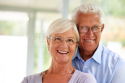 Buy stock photo Embrace, portrait and old couple in home with love, care and happy marriage in retirement together. Relax, elderly man and senior woman in house with smile, support and comfort with morning bonding.