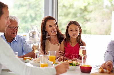 Buy stock photo A family having lunch together