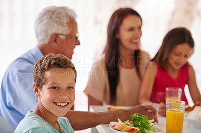 Buy stock photo Cropped shot of a family having lunch together