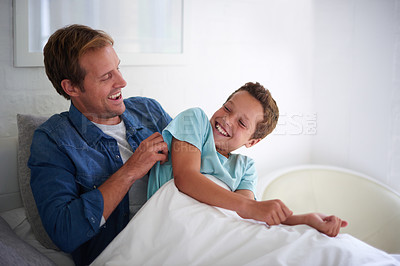 Buy stock photo A father and son having a moment