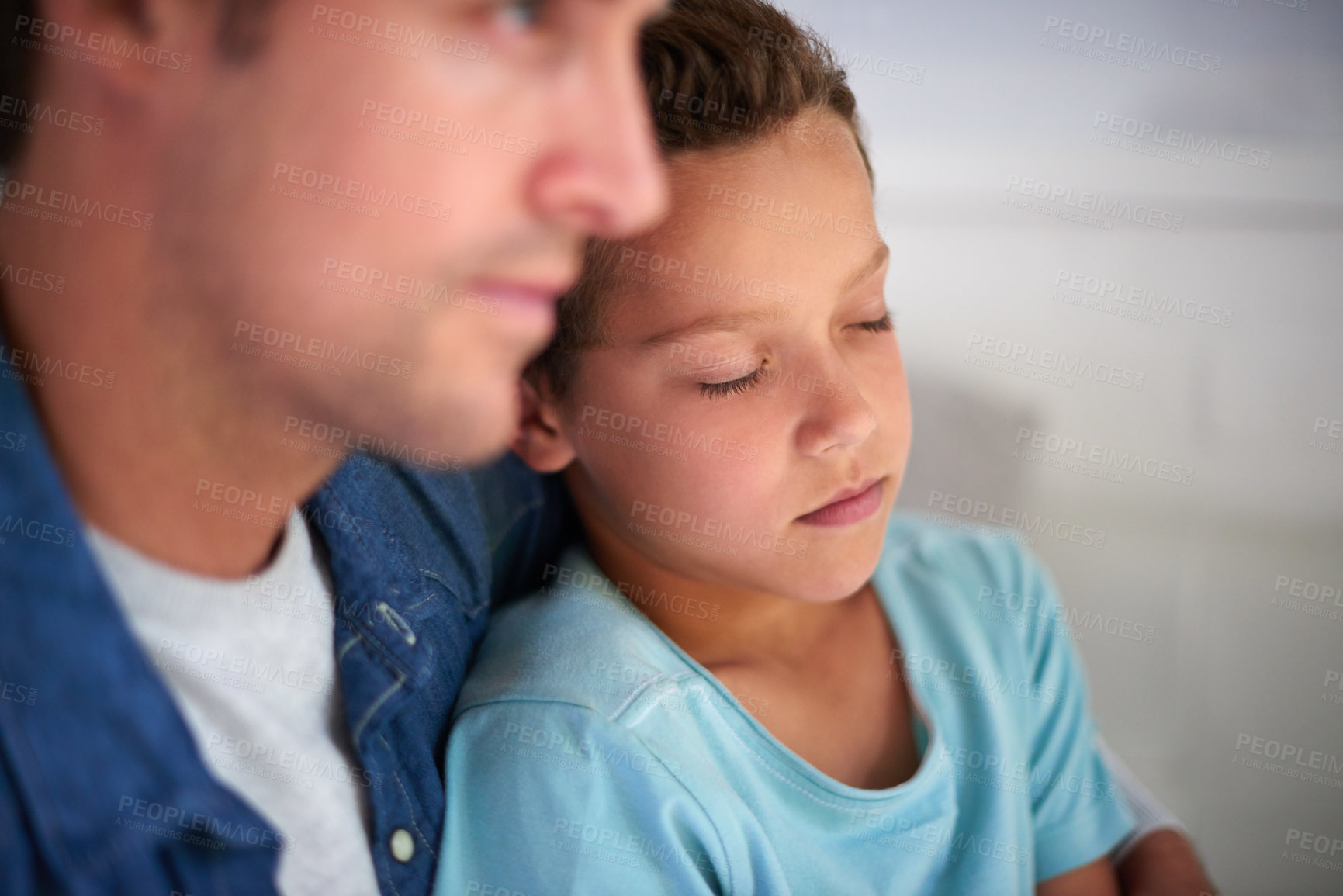 Buy stock photo Shot of a father taking care of his sick little boy at home