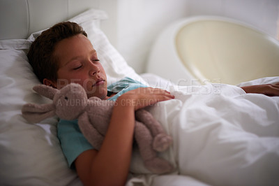 Buy stock photo A little boy asleep in his bed