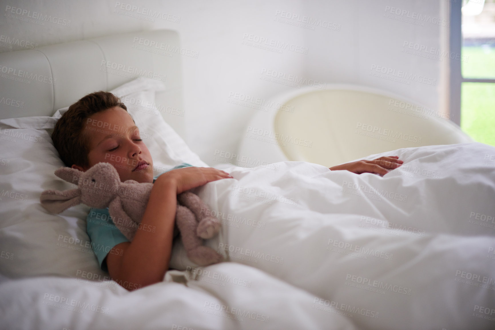 Buy stock photo A little boy asleep in his bed