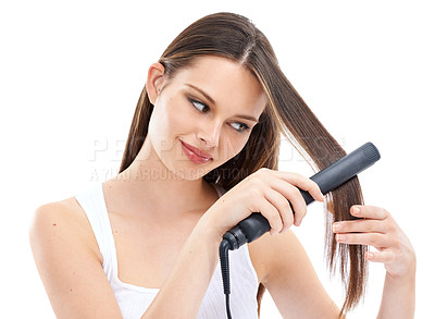 Buy stock photo Woman, hair with hair straightener and beauty with hair care, electric cosmetic tools against studio background. Straight hair, keratin and treatment with hairstyle, shine with wellness and grooming