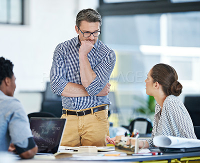 Buy stock photo Shot of a group of designers working together in an office