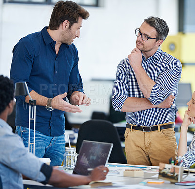 Buy stock photo Shot of a diverse group of designers working together in an office