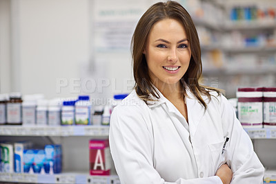 Buy stock photo Woman, happy and arms crossed as pharmacist at drug store with pride for customer service. Female person, portrait and smile or satisfied with confidence at pharmacy for medication and prescription