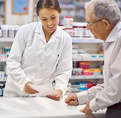 Buy stock photo Pharmacist, senior man and document at counter for consultation, medicine prescription and healthcare advice. Person, customer and paperwork for medical, product help and pill information or pharmacy