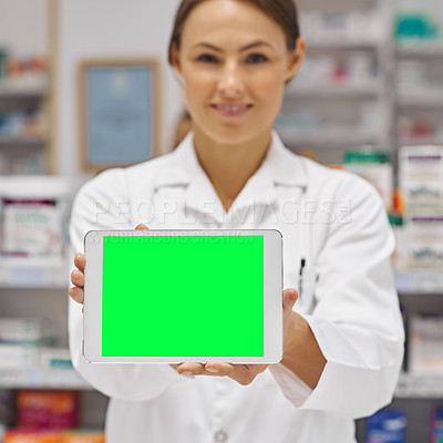 Buy stock photo Portrait of an attractive pharmacist holding up a blank digital tablet display