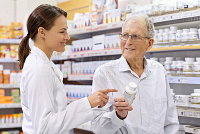 Buy stock photo Woman, pharmacist and senior man with pills for prescription, product information and healthcare advice. Medical, customer and medicine dispensary with instructions, pharmaceutical care and treatment