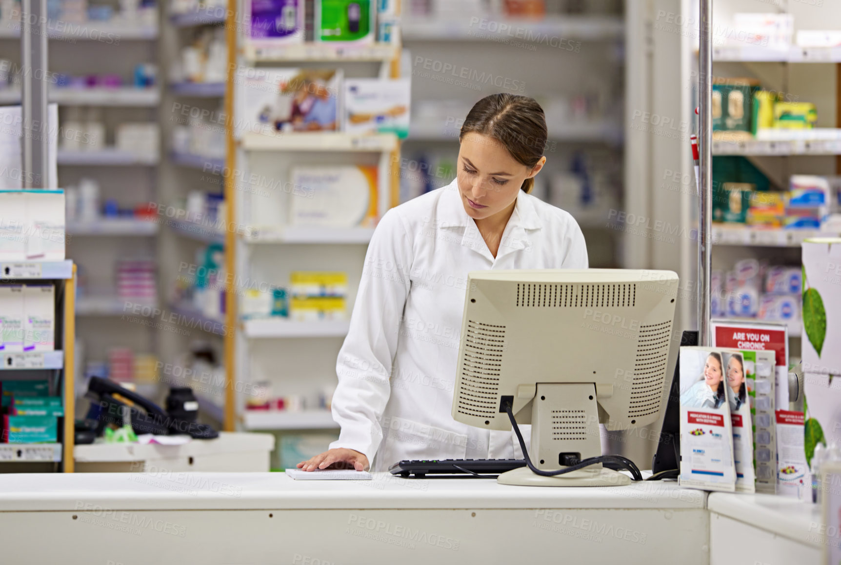 Buy stock photo Pharmacy, computer and stock list with woman at counter in drugstore for customer service, advice and medicine. Prescription drugs, pharmacist and inventory for pills, medication and chemist checkout