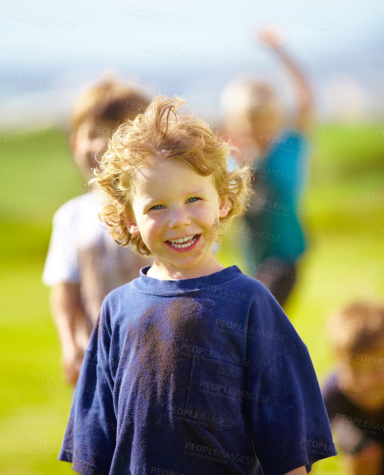 Buy stock photo Dirt, smile and face of child for games by grass, lawn and outdoor playing outside with happiness in nature. Boy, freedom or fun childhood for activity, comic and excited in youth with friends