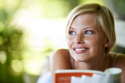 Buy stock photo Summer, thinking and book with woman at park for literature, smile and happiness. Calm, nature and peace with young female person reading in countryside for knowledge, learning and studying mockup