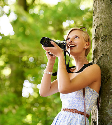 Buy stock photo Happy, woman and photography in nature with trees, camera and vacation in environment. Forest, park and girl filming with natural happiness outdoor on summer holiday, trip or travel with technology
